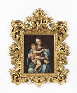 ARTISTA ITALIANO DEL XVI-XVII SECOLO - Madonna con Bambino, in cornice intagliata a racemi e volute e dorata