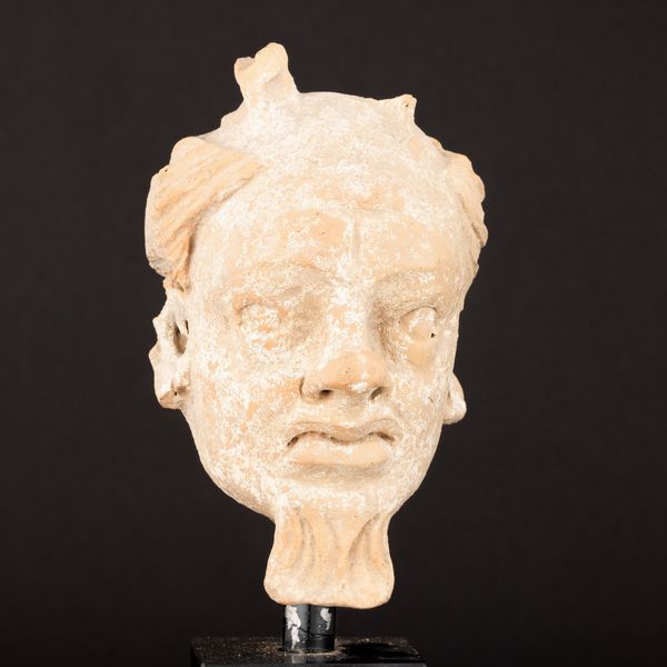 Testa di demone in terracotta, Gandhara, XV secolo  - Asta Arte Orientale - Associazione Nazionale - Case d'Asta italiane