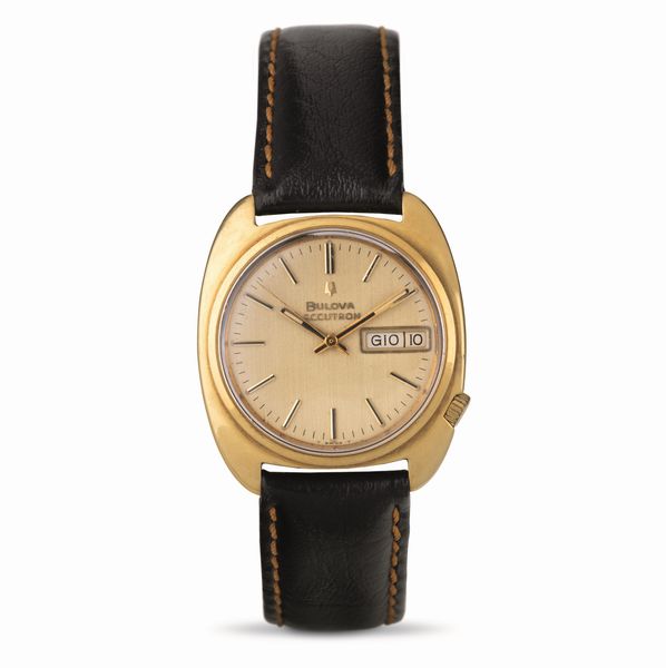 Bulova : Accutron tonneau in oro giallo 18k con indicazione di giorno e data movimento a diapason  - Asta Orologi da Polso - Associazione Nazionale - Case d'Asta italiane