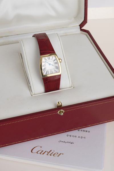 CARTIER : Elegante La Dona in oro giallo 18k, quadrante Argent con numeri Romani, movimento al quarzo con scatola e garanzia  - Asta Orologi da Polso - Associazione Nazionale - Case d'Asta italiane