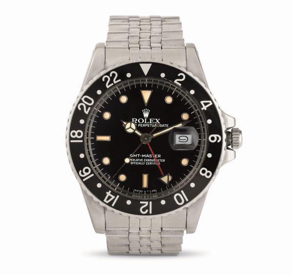 ROLEX : GMT Master ref 16750, in acciaio con ghiera girevole bidirezionale nera, quadrante nero indici bicchierini, bracciale in acciaio Jubilee, accompagnato da garanzia  - Asta Orologi da Polso - Associazione Nazionale - Case d'Asta italiane