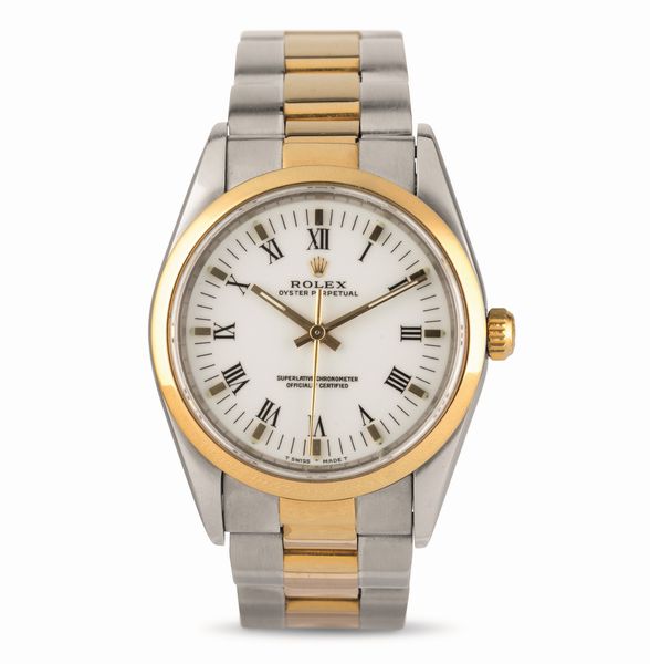 ROLEX : Rolex Classico Oyster Perpetual ref 14203 in acciaio e oro, ghiera liscia quadrante bianco con numeri Romani, bracciale Oyster  - Asta Orologi da Polso - Associazione Nazionale - Case d'Asta italiane