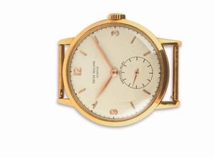 PATEK PHILIPPE : Raro ed elegante Calatrava ref 1513 in oro giallo 18k, quadrante retailer Eberhard Milano, numeri arabi applicati e piccoli secondi in basso  - Asta Orologi da Polso - Associazione Nazionale - Case d'Asta italiane