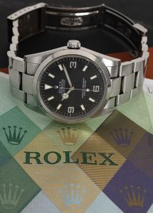 ROLEX : Explorer I ref 114270, quadrante nero numeri Arabi, movimento automatico accompagnato da garanzia originale  - Asta Orologi da Polso - Associazione Nazionale - Case d'Asta italiane