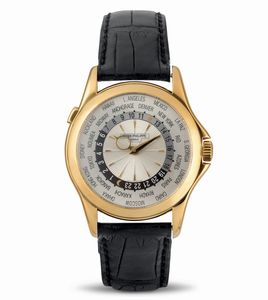 PATEK PHILIPPE - Elegante Worldtime ref 5130J in oro bianco 18k, disco girevole con 24 fusi orari azionabile tramite pulsante a ore 10