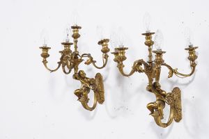 Gruppo di applique a 5 luci in bronzo dorato. XIX secolo  - Asta Antiquariato - Associazione Nazionale - Case d'Asta italiane