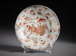 Arte Cinese : Bel piatto in porcellana decorato in rosso ferro e oro.Cina, Dinastia Qing periodo Kangxi.  - Asta Asta 470 | ARTE ORIENTALE Online - Associazione Nazionale - Case d'Asta italiane