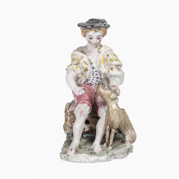 Figurina di giovane con cane. <BR>Liguria, XX secolo.  - Asta Ceramiche e vetri - Associazione Nazionale - Case d'Asta italiane