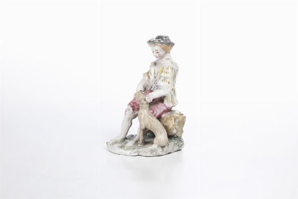 Figurina di giovane con cane. <BR>Liguria, XX secolo.  - Asta Ceramiche e vetri - Associazione Nazionale - Case d'Asta italiane