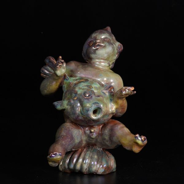 Figura di putto con pesce alla maniera di Melandri, XX secolo.  - Asta Ceramiche e vetri - Associazione Nazionale - Case d'Asta italiane