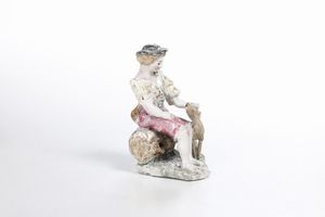 Figurina di giovane con cane. <BR>Liguria, XX secolo.  - Asta Ceramiche e vetri - Associazione Nazionale - Case d'Asta italiane