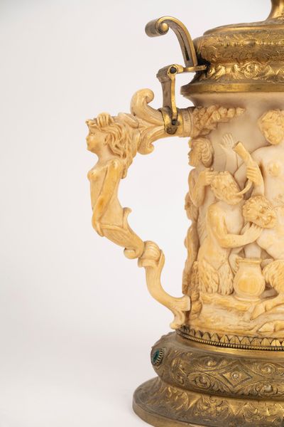 Scuola tedesca, secolo XIX : ☼ Tankard in avorio e metallo dorato  - Asta Incanti d'Arte - Associazione Nazionale - Case d'Asta italiane