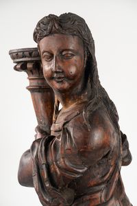 Scuola dell'Italia centrale, secolo XVII : Due sculture in legno intagliato a patina scura, raffiguranti figure reggi torce  - Asta Incanti d'Arte - Associazione Nazionale - Case d'Asta italiane