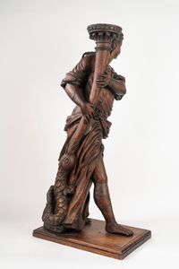 Scuola dell'Italia centrale, secolo XVII : Due sculture in legno intagliato a patina scura, raffiguranti figure reggi torce  - Asta Incanti d'Arte - Associazione Nazionale - Case d'Asta italiane