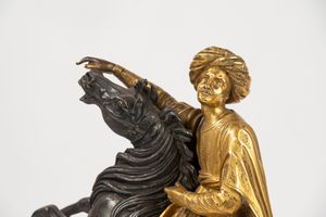 Scultura orientalista raffigurante cavallo e cavaliere in bronzo dorato e a patina scura, secolo XIX  - Asta Incanti d'Arte - Associazione Nazionale - Case d'Asta italiane