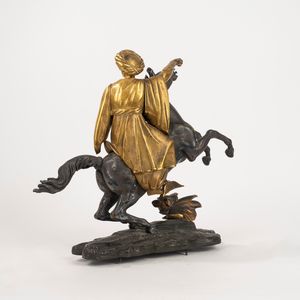 Scultura orientalista raffigurante cavallo e cavaliere in bronzo dorato e a patina scura, secolo XIX  - Asta Incanti d'Arte - Associazione Nazionale - Case d'Asta italiane