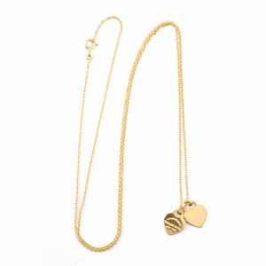 Tiffany & Co.® - Collezione RETURN TO TIFFANY™: girocollo e pendente in oro, double heart