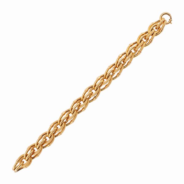 Bracciale a maglie intrecciate in oro giallo 18kt  - Asta Gioielli e Orologi Web Only - Associazione Nazionale - Case d'Asta italiane