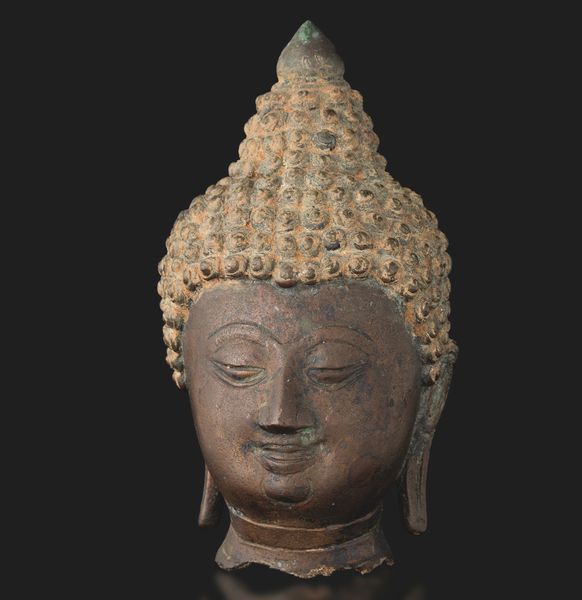 Testa di buddha in bronzo, Thailandia, XIX secolo, Regno di Rattanakosin/del Siam (1782-1932)  - Asta Arte Orientale - Associazione Nazionale - Case d'Asta italiane