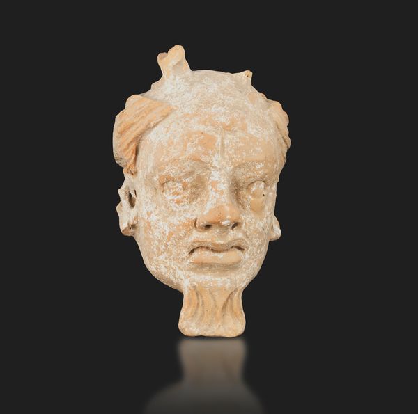 Testa di demone in terracotta, Gandhara, XV secolo  - Asta Arte Orientale - Associazione Nazionale - Case d'Asta italiane