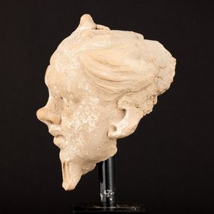 Testa di demone in terracotta, Gandhara, XV secolo  - Asta Arte Orientale - Associazione Nazionale - Case d'Asta italiane