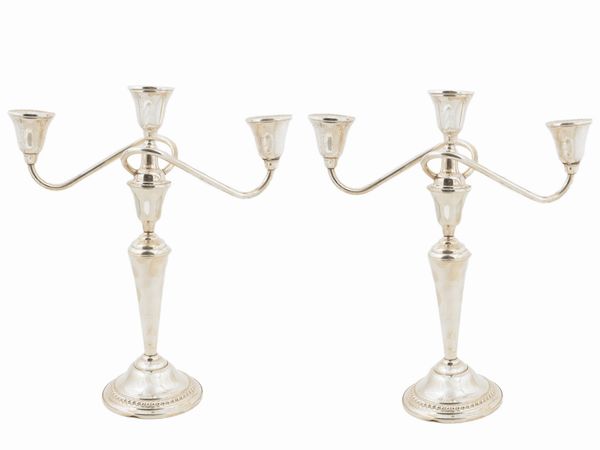 Coppia di candelabri in argento sterling  - Asta Una casa fiorentina - Associazione Nazionale - Case d'Asta italiane