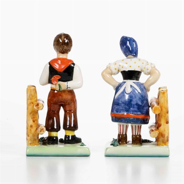 Una coppia di figurine e una coppia di reggilibri. <BR>Italia, prima met de XX secolo.  - Asta Ceramiche - Associazione Nazionale - Case d'Asta italiane