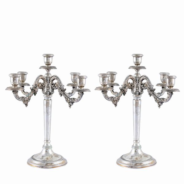 Coppia di candelabri in argento a cinque luci  - Asta Argenti e l'Arte della Tavola - Associazione Nazionale - Case d'Asta italiane