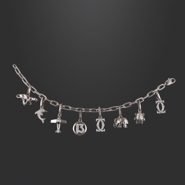 BRACCIALE CON CHARMS, CARTIER  - Asta GIOIELLI IMPORTANTI - Associazione Nazionale - Case d'Asta italiane