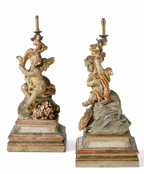 Coppia di cherubini reggitorcia in legno laccato e dorato. Scultore italiano del XVII-XVIII secolo  - Asta Dipinti e Sculture del XIX-XX secolo - Associazione Nazionale - Case d'Asta italiane