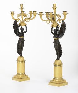 Coppia di candelabri in bronzo dorato e patinato. XIX secolo  - Asta Dipinti e Sculture del XIX-XX secolo - Associazione Nazionale - Case d'Asta italiane