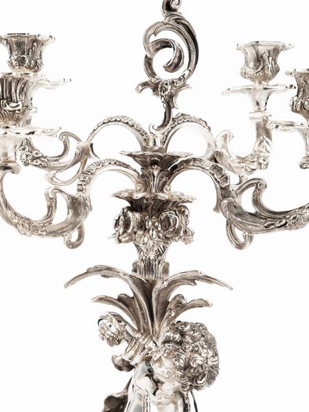 Importante coppia di candelabri con sculture  - Asta Argenti Antichi e del XX Secolo - Associazione Nazionale - Case d'Asta italiane