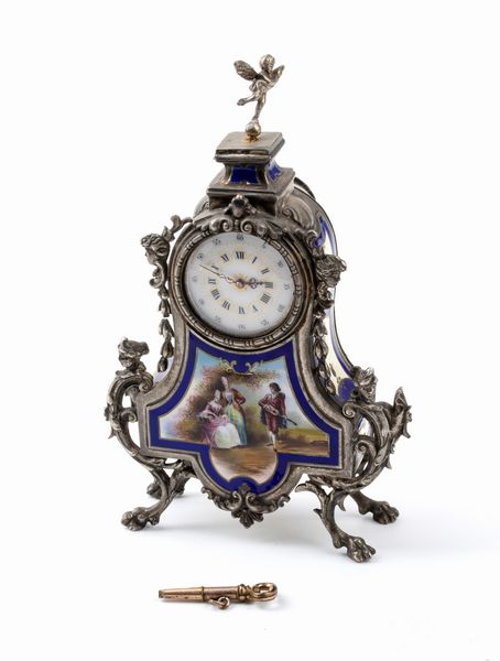 Orologio da tavolo in argento e smalti  - Asta Piccoli Orologi da tavolo Art Dco e Saliere d'Epoca dalle Collezioni Melandri di Objets de Vertu - Associazione Nazionale - Case d'Asta italiane