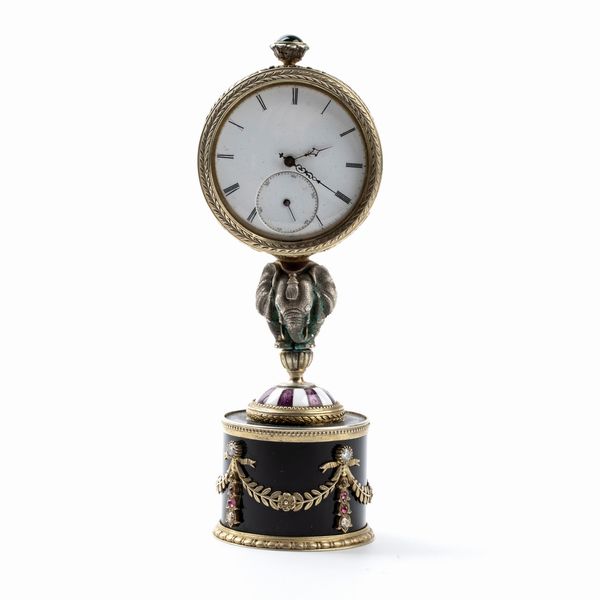 FABERGÉ CARL, a firma di : Orologio da tavolo in argento dorato e smalti  - Asta Piccoli Orologi da tavolo Art Dco e Saliere d'Epoca dalle Collezioni Melandri di Objets de Vertu - Associazione Nazionale - Case d'Asta italiane