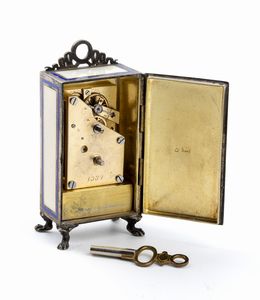 Orologio da tavolo Art Dco in argento e smalti  - Asta Piccoli Orologi da tavolo Art Dco e Saliere d'Epoca dalle Collezioni Melandri di Objets de Vertu - Associazione Nazionale - Case d'Asta italiane