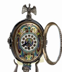 Orologio da tavolo in argento e smalti  - Asta Piccoli Orologi da tavolo Art Dco e Saliere d'Epoca dalle Collezioni Melandri di Objets de Vertu - Associazione Nazionale - Case d'Asta italiane