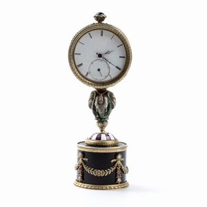 FABERGÉ CARL, a firma di - Orologio da tavolo in argento dorato e smalti