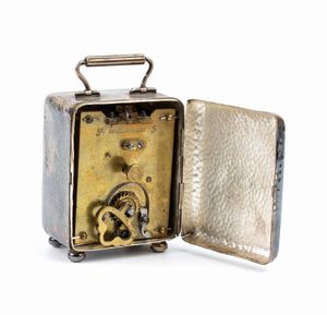 Marks & Cohen : Orologio da tavolo Art Dco in argento  - Asta Piccoli Orologi da tavolo Art Dco e Saliere d'Epoca dalle Collezioni Melandri di Objets de Vertu - Associazione Nazionale - Case d'Asta italiane