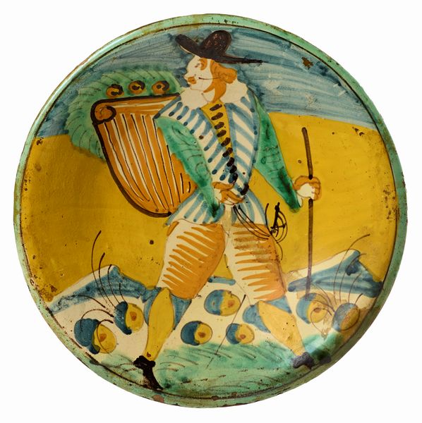 Piatto in maiolica policroma giallo, ocra, verde e blu  - Asta Maioliche, Sculture e Dipinti Antichi - Associazione Nazionale - Case d'Asta italiane