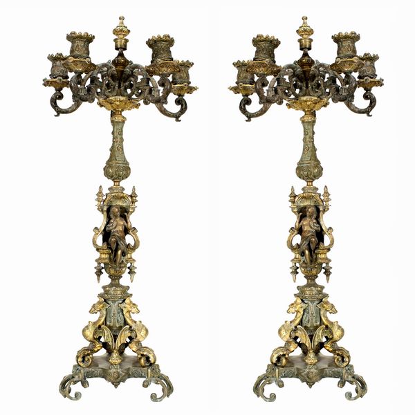 Coppia di candelabri in bronzo dorato e patinato a cinque luci  - Asta Dipinti Antichi e del XIX Secolo Arredi e Sculture - Associazione Nazionale - Case d'Asta italiane