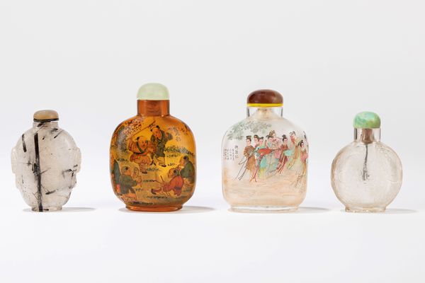 Lotto di quattro snuff bottles in vetro e quarzo  - Asta Arte Orientale  - Associazione Nazionale - Case d'Asta italiane