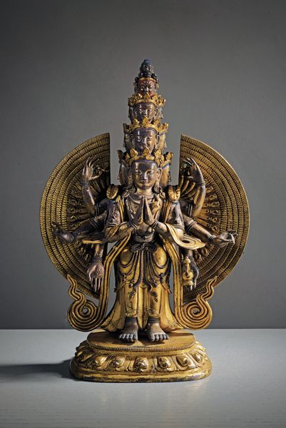 Scultura in bronzo dorato raffigurante Avalokiteshvara Ekadashamukha  - Asta Arte Orientale  - Associazione Nazionale - Case d'Asta italiane