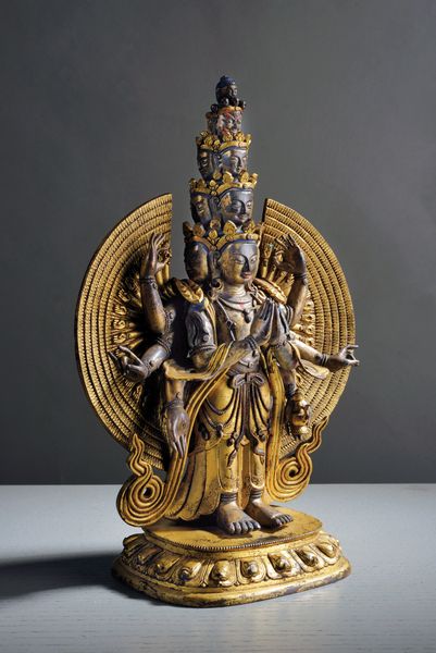 Scultura in bronzo dorato raffigurante Avalokiteshvara Ekadashamukha  - Asta Arte Orientale  - Associazione Nazionale - Case d'Asta italiane