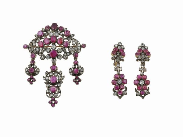 Demi-parure composta da spilla ed orecchini con rubini  - Asta Fine Jewels - Associazione Nazionale - Case d'Asta italiane