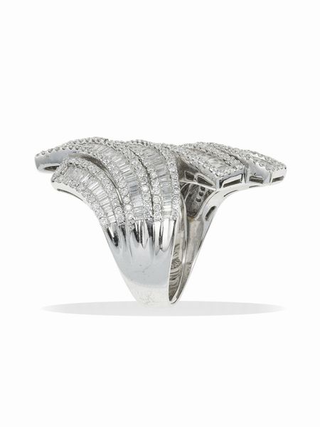 Anello con diamanti taglio baguettes e brillante  - Asta Fine Jewels - Associazione Nazionale - Case d'Asta italiane