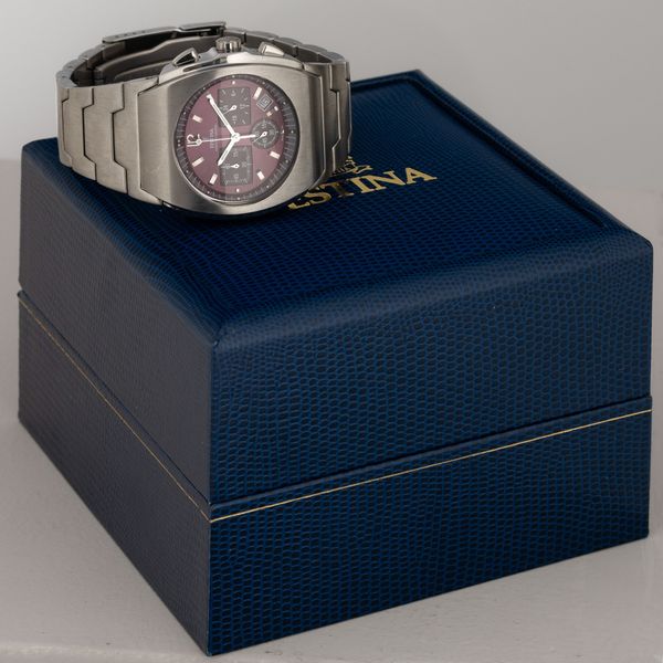 Festina : Chronograph F14 in acciaio di forma tonneau con bracciale integrato, moviento al quarzo con quadrante color vinaccia, 44x39 mm  - Asta Orologi da Polso - Associazione Nazionale - Case d'Asta italiane