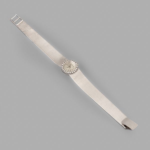 Baume & Mercier : Baume & Mercier Lady in oro bianco 18k, quadrante Argent, brillanti, indici applicati, bracciale integrato, carica manuale, 15,5 mm  - Asta Orologi da Polso - Associazione Nazionale - Case d'Asta italiane