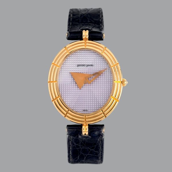 GERALD GENTA : Elegante orologio da polso di forma ovale, in oro giallo 18k, quadrante color malva accompagnato da garanzia originale  - Asta Orologi da Polso - Associazione Nazionale - Case d'Asta italiane