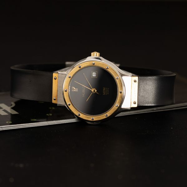 HUBLOT : MDM Lady acciaio e oro al quarzo, quadrante nero con datario, cinturino in gomma con garanzia, 25,5 mm  - Asta Orologi da Polso - Associazione Nazionale - Case d'Asta italiane