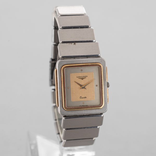 LONGINES : Longines Forma in acciaio con inserti in oro, quadrante argento, movimento al quarzo, bracciale in acciaio, 26x28 mm, 1970 circa  - Asta Orologi da Polso - Associazione Nazionale - Case d'Asta italiane